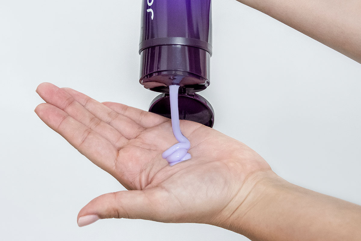 Color Balance Purple conditioner in hand